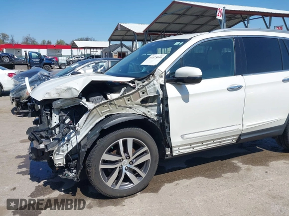 2016 Honda Pilot Touring with VIN 5FNYF6H9XGB005516, listed as a IAAI auction lot 41975049 with 85,217 mi miles. Bid and sale history available at carsss.com. Image 6.