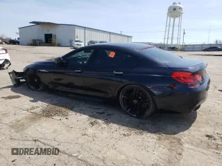 2015 BMW 6 Series 650i z VIN WBA6B2C50FGB99462, wystawiony jako Copart lot #54058515 z przebiegiem 96 662 mil mil oraz Tytuł czysty. Historia ofert i sprzedaży dostępna na DreamBid. Obrazek 2.