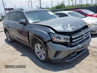 2021 Volkswagen Atlas SE z VIN 1V2WR2CA4MC541958, wystawiony jako IAAI lot #42476012 z przebiegiem 83 233 mil mil oraz . Historia ofert i sprzedaży dostępna na DreamBid. Obrazek 1.