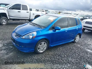 2007 Honda Fit Sport z VIN JHMGD38677S060383, wystawiony jako IAAI lot #41570104 z przebiegiem 213 350 mil mil oraz . Historia ofert i sprzedaży dostępna na DreamBid. Obrazek 2.