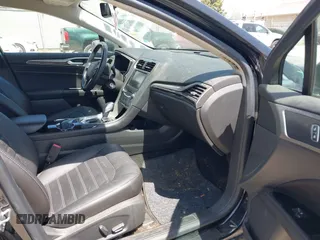 2014 Ford Fusion SE Hybrid with VIN 3FA6P0LU6ER312678, listed as a IAAI auction lot 42140117 with 103,154 mi miles. Bid and sale history available at carsss.com. Image 5.