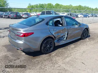 2025 Toyota Camry LE with VIN 4T1DAACK6SU557374, listed as a IAAI auction lot 42135249 with 516 mi miles and . Bid and sale history available at DreamBid. Image 4.