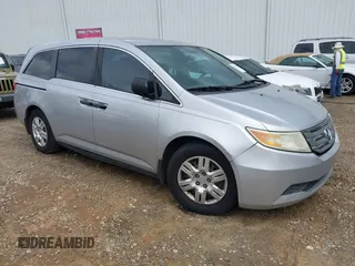 2011 Honda Odyssey LX z VIN 5FNRL5H23BB055208, wystawiony jako IAAI lot #42457759 z przebiegiem 207 493 mil mil oraz . Historia ofert i sprzedaży dostępna na DreamBid. Obrazek 1.