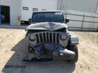 2022 Jeep Wrangler Unlimited Sahara Altitude with VIN 1C4HJXEG4NW248402, listed as a Copart auction lot 63052465 with 36,732 mi miles and Salvage title. Bid and sale history available at DreamBid. Image 5.
