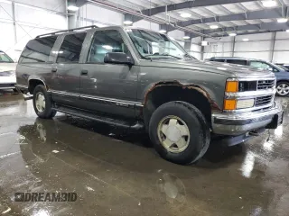 1999 Chevrolet Suburban with VIN 3GNFK16R8XG149091, listed as a Copart auction lot 71300024 with 254,044 mi miles and Salvage Title. Bid and sale history available at carsss.com. Image 4.