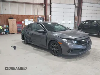 2019 Honda Civic Sport with VIN 2HGFC2F89KH601708, listed as a IAAI auction lot 42093410 with 129,479 mi miles and . Bid and sale history available at DreamBid. Image 1.