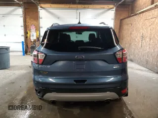 2018 Ford Escape SEL with VIN 1FMCU9HDXJUB39135, listed as a Copart auction lot 52093075 with 69,604 mi miles and Salvage Title. Bid and sale history available at carsss.com. Image 6.