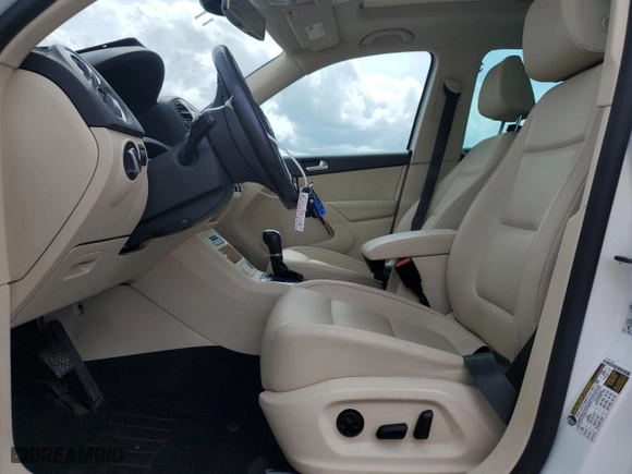 2017 Volkswagen Tiguan Wolfsburg Edition with VIN WVGSV7AX0HK014796, listed as a Copart auction lot 51113015 with 51,592 mi miles and Salvage Title. Bid and sale history available at carsss.com. Image 7.