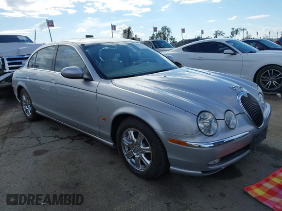 2003 Jaguar S-Type with VIN SAJEA01T83FM48713, listed as a IAAI auction lot 41402152 with 142,875 mi miles and . Bid and sale history available at DreamBid. Image 1.