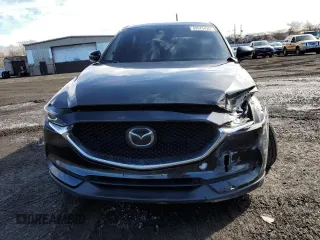 2019 Mazda CX-5 Touring with VIN JM3KFBCM7K0628309, listed as a Copart auction lot 49575435 with 92,687 mi miles and Salvage Title. Bid and sale history available at carsss.com. Image 5.