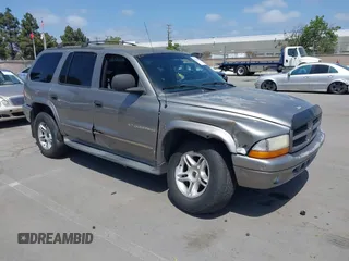 2000 Dodge Durango z VIN 1B4HS28N9YF271816, wystawiony jako IAAI lot #42105485 z przebiegiem 172 423 mil mil oraz . Historia ofert i sprzedaży dostępna na DreamBid. Obrazek 1.