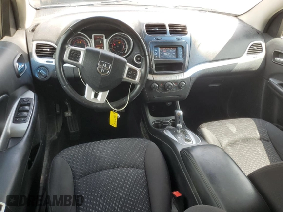 2017 Dodge Journey SXT with VIN 3C4PDDBG9HT639285, listed as a Copart auction lot 58600005 with 124,887 mi miles and Salvage title. Bid and sale history available at DreamBid. Image 8.