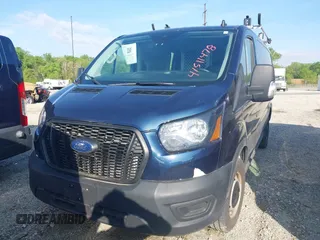 2023 Ford Transit Cargo with VIN 1FTBR1Y84PKB55342, listed as a IAAI auction lot 41511478 with 27,688 mi miles and . Bid and sale history available at DreamBid. Image 12.