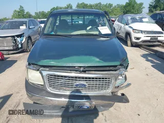 2000 Ford F-150 XL with VIN 1FTZF1720YNB20382, listed as a IAAI auction lot 42613663 with Not provided miles and . Bid and sale history available at DreamBid. Image 12.