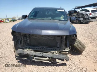 2022 Chevrolet Suburban LT with VIN 1GNSKCKDXNR317511, listed as a Copart auction lot 52573795 with 134,062 mi miles and Salvage Title. Bid and sale history available at DreamBid. Image 5.