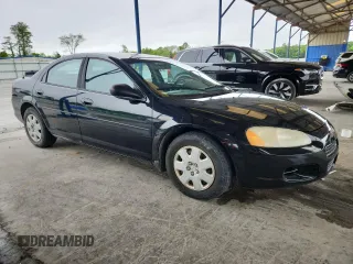 2002 Dodge Stratus SE z VIN 1B3EL36R02N198011, wystawiony jako Copart lot #58213505 z przebiegiem 104 464 mil mil oraz Tytuł czysty. Historia ofert i sprzedaży dostępna na DreamBid. Obrazek 4.