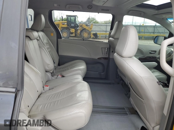 2012 Toyota Sienna XLE AAS z VIN 5TDYK3DC9CS271157, wystawiony jako Copart lot #55418065 z przebiegiem 172 988 mil mil oraz Nie do naprawy • Non repairable. Historia ofert i sprzedaży dostępna na DreamBid. Obrazek 11.