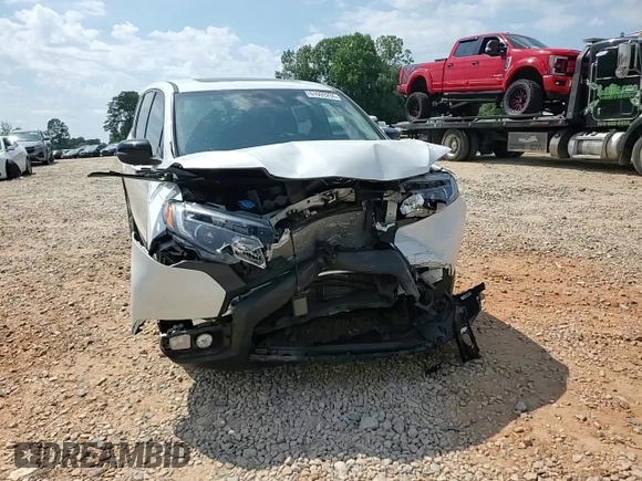 2021 Honda Passport EX-L with VIN 5FNYF7H59MB016165, listed as a Copart auction lot 61999294 with 0 mi miles and Salvage Title. Bid and sale history available at carsss.com. Image 10.