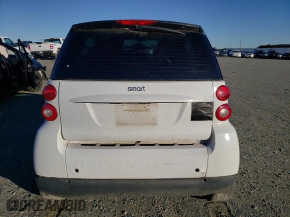 2011 Smart fortwo Pure z VIN WMEEJ3BA4BK473760, wystawiony jako Copart lot #78081344 z przebiegiem 75 966 mil mil oraz Szkoda całkowita • Salvage title. Historia ofert i sprzedaży dostępna na DreamBid. Obrazek 10.