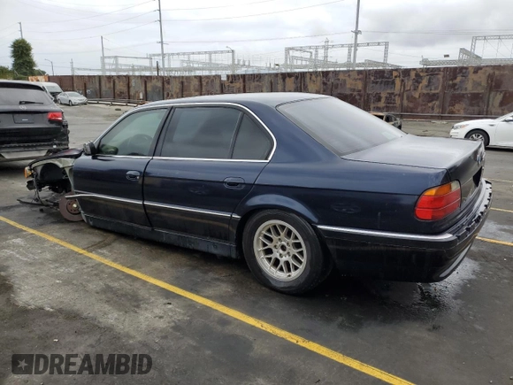 1998 BMW 7 Series 740il with VIN WBAGJ8321WDM23045, listed as a Copart auction lot 87018324 with 43,906 mi miles and Salvage Title. Bid and sale history available at carsss.com. Image 2.