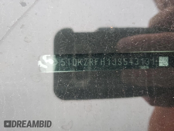 2018 Toyota Highlander SE z VIN 5TDKZRFH1JS543131, wystawiony jako Copart lot #59556625 z przebiegiem Nie podano mil oraz Szkoda całkowita • Salvage title. Historia ofert i sprzedaży dostępna na DreamBid. Obrazek 13.