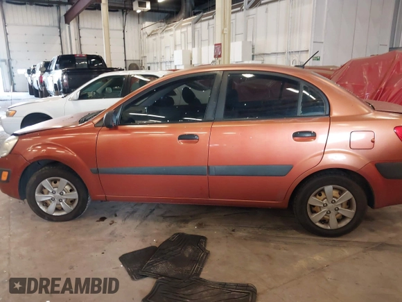 2009 Kia Rio LX with VIN KNADE223796547229, listed as a IAAI auction lot 41947371 with 153,061 mi miles and . Bid and sale history available at DreamBid. Image 14.