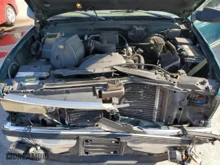 1999 Chevrolet Suburban with VIN 3GNEC16R2XG104995, listed as a Copart auction lot 71991534 with 247,633 mi miles and Salvage Title. Bid and sale history available at carsss.com. Image 12.