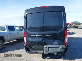 2016 Ford Transit Cargo z VIN 1FTYR2CM0GKB51759, wystawiony jako IAAI lot #41602091 z przebiegiem 158 997 mil mil oraz . Historia ofert i sprzedaży dostępna na DreamBid. Obrazek 16.