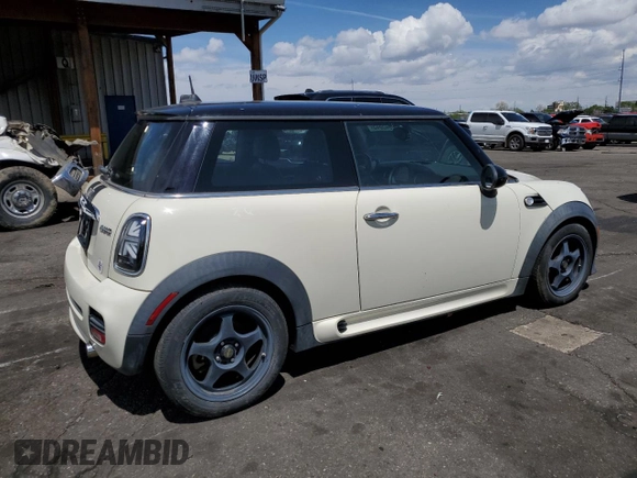 2013 MINI Hardtop with VIN WMWSU3C58DT373021, listed as a Copart auction lot 52945845 with 83,865 mi miles and Salvage Title. Bid and sale history available at DreamBid. Image 3.