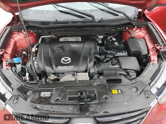 2016 Mazda CX-5 Grand Touring with VIN JM3KE4DY5G0660201, listed as a Copart auction lot 52165205 with 108,231 mi miles and Salvage Title. Bid and sale history available at DreamBid. Image 12.