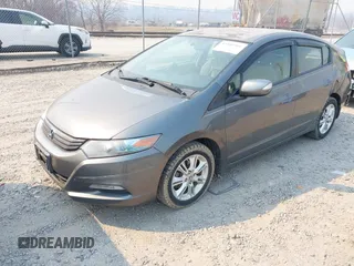 2010 Honda Insight EX with VIN JHMZE2H75AS027964, listed as a IAAI auction lot 41889301 with 136,485 mi miles and . Bid and sale history available at DreamBid. Image 2.