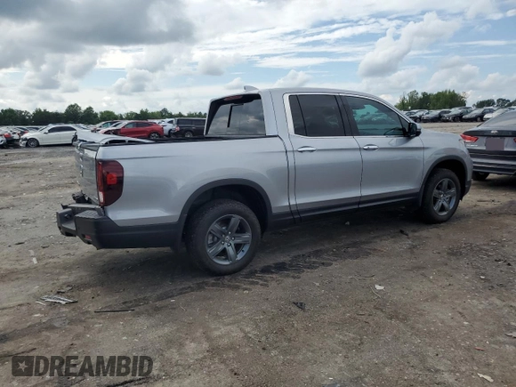 2023 Honda Ridgeline RTL-E with VIN 5FPYK3F70PB018858, listed as a Copart auction lot 64210205 with 16,562 mi miles and Salvage title. Bid and sale history available at DreamBid. Image 3.