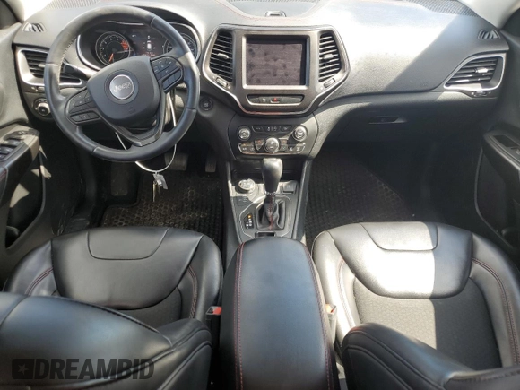 2019 Jeep Cherokee Trailhawk with VIN 1C4PJMBX0KD311114, listed as a Copart auction lot 58799765 with 60,833 mi miles and Salvage title. Bid and sale history available at DreamBid. Image 8.