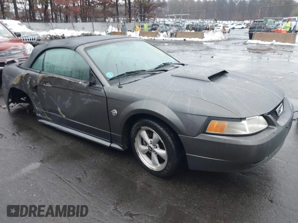 2004 Ford Mustang GT Deluxe z VIN 1FAFP45X74F128442, wystawiony jako IAAI lot #41580930 z przebiegiem 100 801 mil mil oraz . Historia ofert i sprzedaży dostępna na DreamBid. Obrazek 1.
