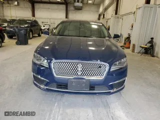 2020 Lincoln MKZ Hybrid Reserve with VIN 3LN6L5LU3LR610780, listed as a Copart auction lot 77013874 with 64,345 mi miles and Salvage Title. Bid and sale history available at carsss.com. Image 5.