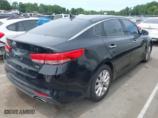 2016 Kia Optima EX with VIN 5XXGU4L38GG075652, listed as a IAAI auction lot 39544592 with 151,960 mi miles. Bid and sale history available at carsss.com. Image 4.