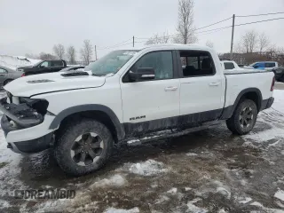 2022 Ram 1500 Rebel z VIN 1C6SRFLT1NN453312, wystawiony jako Copart lot #47361115 z przebiegiem 44 342 mil mil oraz Nie do naprawy • Non repairable. Historia ofert i sprzedaży dostępna na DreamBid. Obrazek 1.