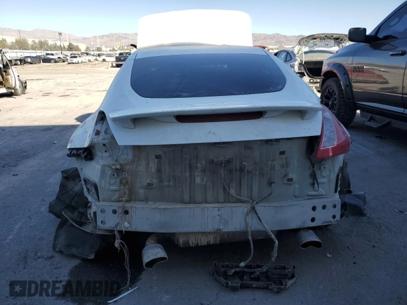 2017 Nissan 370Z z VIN JN1AZ4EH5HM954542, wystawiony jako Copart lot #44384345 z przebiegiem 87 259 mil mil oraz Szkoda całkowita • Salvage title. Historia ofert i sprzedaży dostępna na DreamBid. Obrazek 6.
