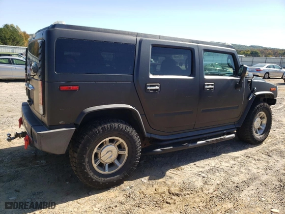 2005 Hummer H2 SUV with VIN 5GRGN23U65H108432, listed as a Copart auction lot 76786844 with 248,780 mi miles and Salvage Title. Bid and sale history available at carsss.com. Image 3.