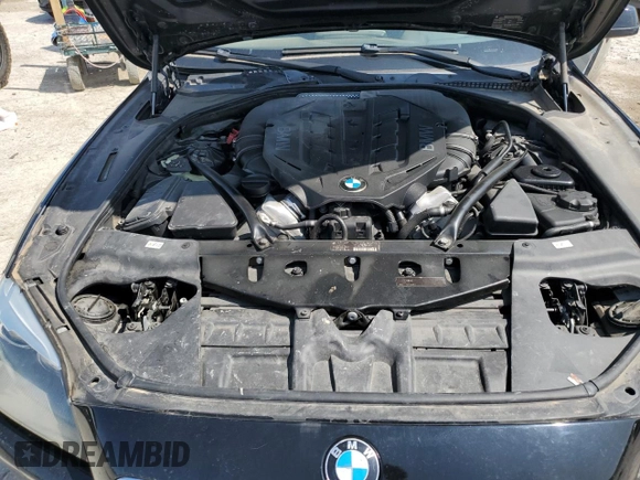 2012 BMW 6 Series 650i z VIN WBALZ3C55CDL70172, wystawiony jako Copart lot #58656785 z przebiegiem 104 657 mil mil oraz Czysty tytuł • Clean title. Historia ofert i sprzedaży dostępna na DreamBid. Obrazek 11.