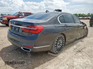2016 BMW 7 Series 740i with VIN WBA7E2C57GG714564, listed as a Copart auction lot 64005965 with 111,598 mi miles and Salvage title. Bid and sale history available at DreamBid. Image 3.