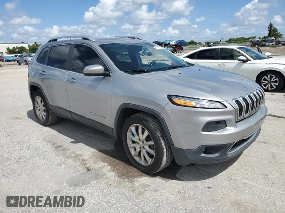 2016 Jeep Cherokee Limited with VIN 1C4PJMDB5GW244734, listed as a Copart auction lot 64608765 with 166,953 mi miles and Salvage title. Bid and sale history available at DreamBid. Image 4.