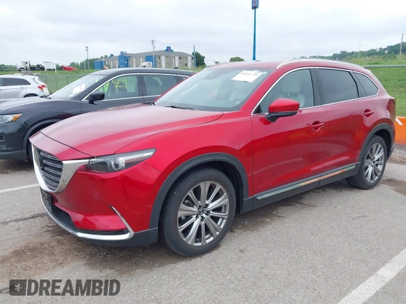 2021 Mazda CX-9 Signature with VIN JM3TCBEY9M0511928, listed as a IAAI auction lot 42231925 with 26,367 mi miles and . Bid and sale history available at DreamBid. Image 2.