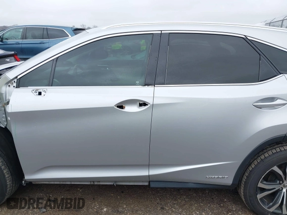 2016 Lexus RX 450h with VIN 2T2BGMCA6GC002928, listed as a IAAI auction lot 41566359 with 98,437 mi miles and . Bid and sale history available at DreamBid. Image 14.