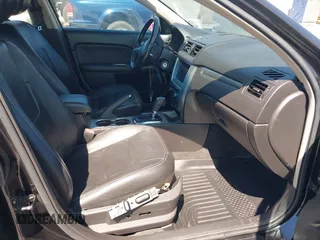 2012 Ford Fusion Hybrid z VIN 3FADP0L3XCR408261, wystawiony jako IAAI lot #42781210 z przebiegiem 281 961 mil mil oraz . Historia ofert i sprzedaży dostępna na DreamBid. Obrazek 5.
