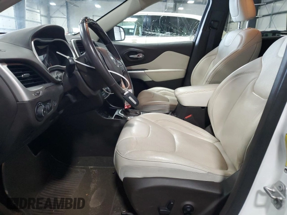 2016 Jeep Cherokee Overland with VIN 1C4PJLJB0GW302604, listed as a Copart auction lot 70624834 with 96,394 mi miles and Salvage title. Bid and sale history available at DreamBid. Image 7.