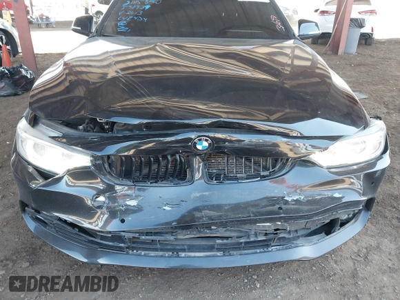 2015 BMW 4 Series 428i with VIN WBA3N3C55FK232613, listed as a IAAI auction lot 41865898 with 104,585 mi miles and . Bid and sale history available at carsss.com. Image 6.