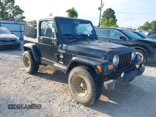 2000 Jeep Wrangler Sahara with VIN 1J4FA59SXYP718029, listed as a IAAI auction lot 42583372 with 260,811 mi miles and . Bid and sale history available at DreamBid. Image 1.