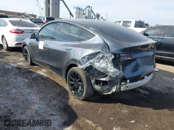 2022 Tesla Model Y Long Range z VIN 7SAYGDEE6NA013757, wystawiony jako IAAI lot #41364867 z przebiegiem 33 621 mil mil oraz . Historia ofert i sprzedaży dostępna na DreamBid. Obrazek 3.