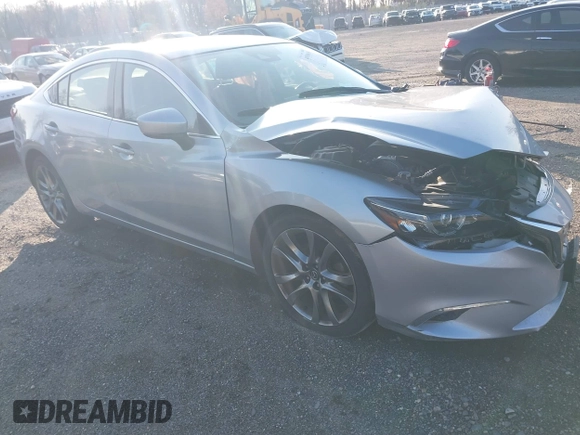 2017 Mazda 6 Grand Touring with VIN JM1GL1W50H1132261, listed as a IAAI auction lot 41930610 with 54,431 mi miles and . Bid and sale history available at DreamBid. Image 1.
